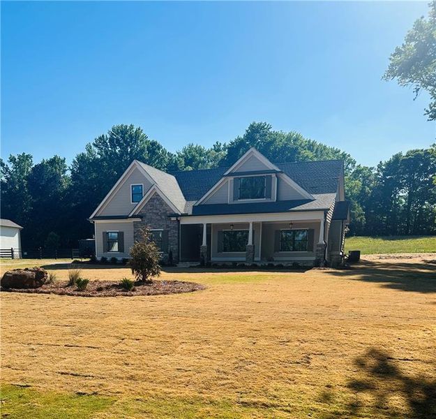Front exterior of a new home in , Covington, GA, highlighting curb appeal (Image 20).