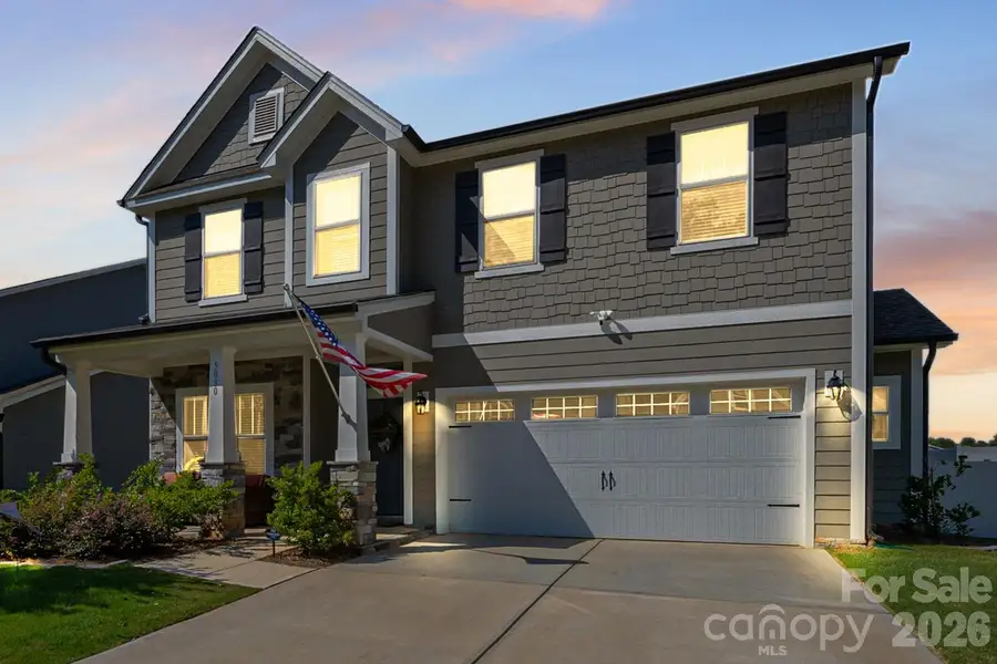 Front exterior of a new home in , Mount Holly, NC, highlighting curb appeal (Image 23).