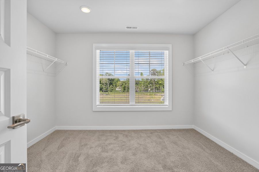 Spacious, unfurnished interior of a new home in The Fairways at Mirror Lake, Villa Rica (Image 60).