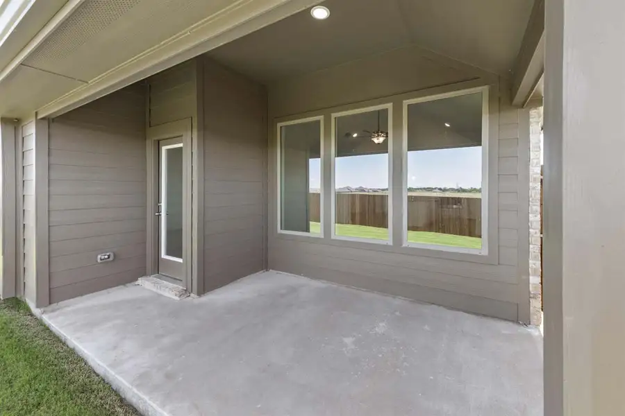 Exterior details and patio area of a home in Heartland, Heartland (Image 3).