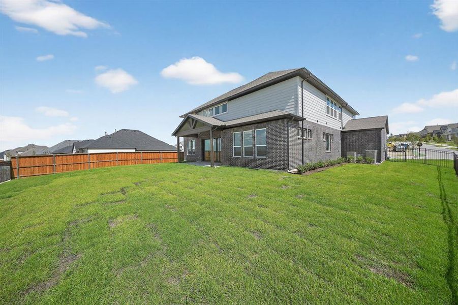 Exterior details and patio area of a home in Walsh Ranch, Fort Worth (Image 4).