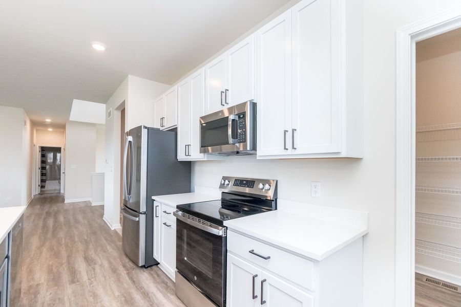 Furnished interior view inside a new home in Mystic Ridge, Whitmore Lake (Image 37).