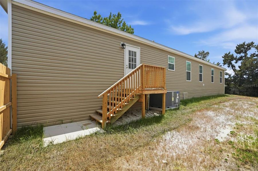 Exterior details and patio area of a home in , Brooksville (Image 19).