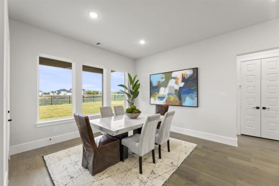 Representative furnished interior of a home built from the Tahiti by Stonefield Homes in Heath Golf and Yacht Club, Rockwall (Image 43).
