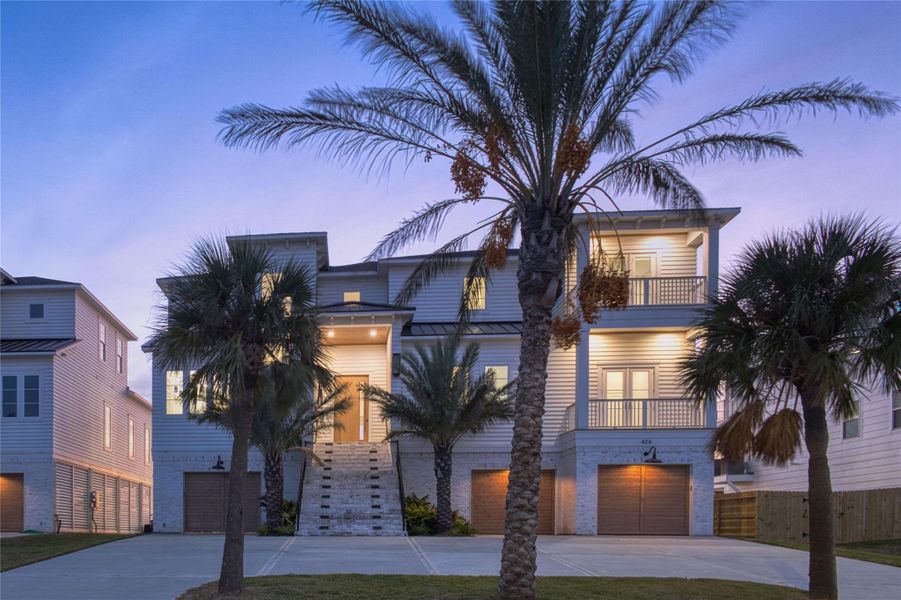 Front exterior of a new home in , Galveston, TX, highlighting curb appeal (Image 25).