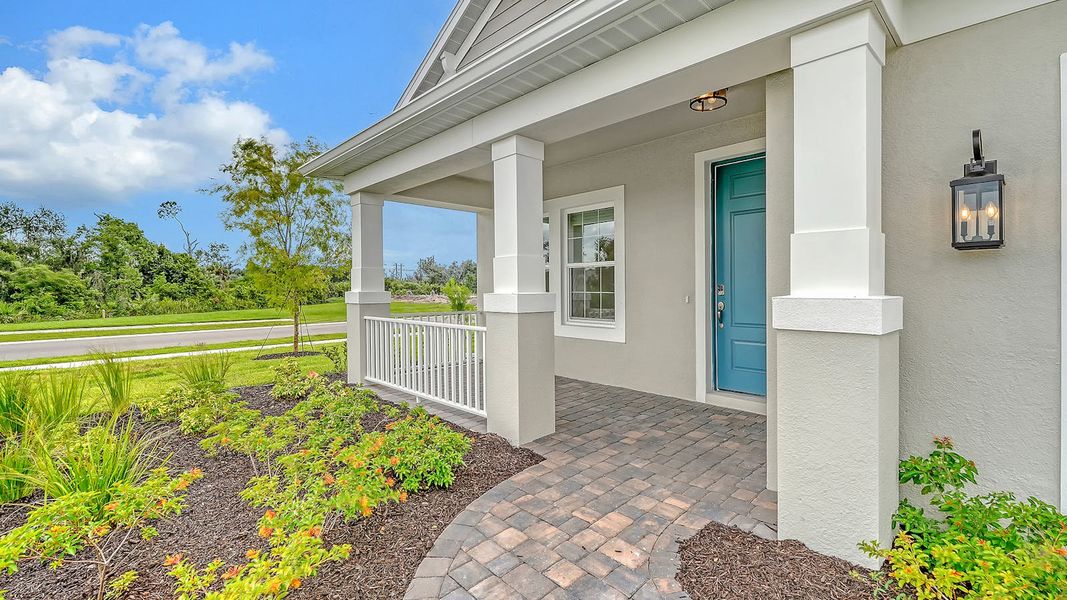 Exterior details and patio area of a home in Wildleaf Real Estate and Homes for Sale in Parrish, FL - Neal Communities, Parrish (Image 2).