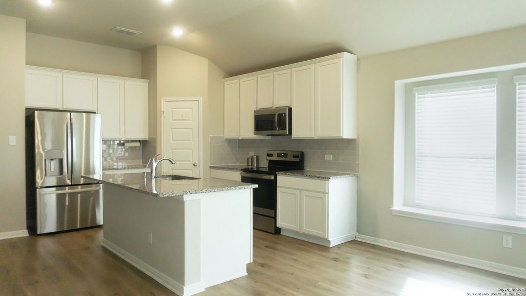 Furnished interior view inside a new home in Summer Hills, San Antonio (Image 6).