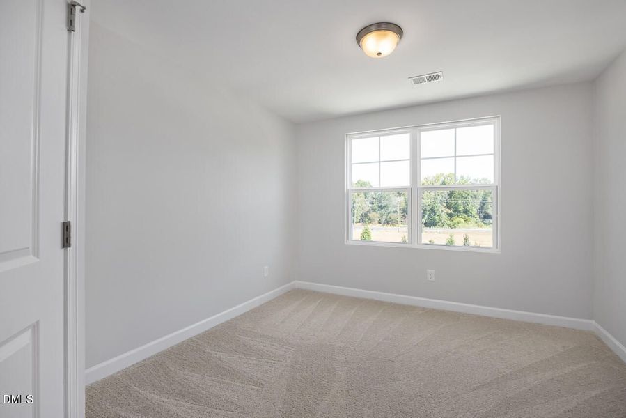 Spacious, unfurnished interior of a new home in Springvale, Fuquay Varina (Image 17).