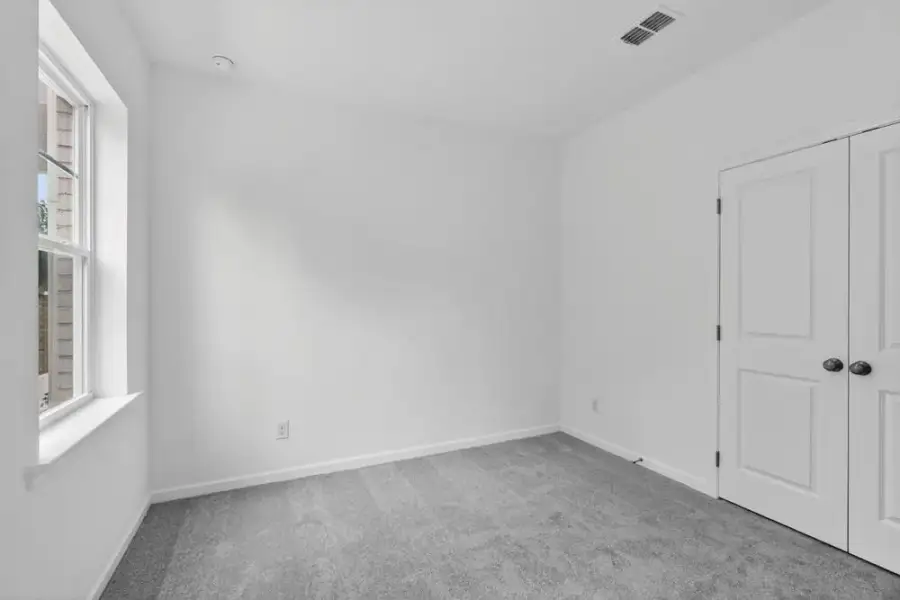 Spacious, unfurnished interior of a new home in Chandler Run, Tucker (Image 41).