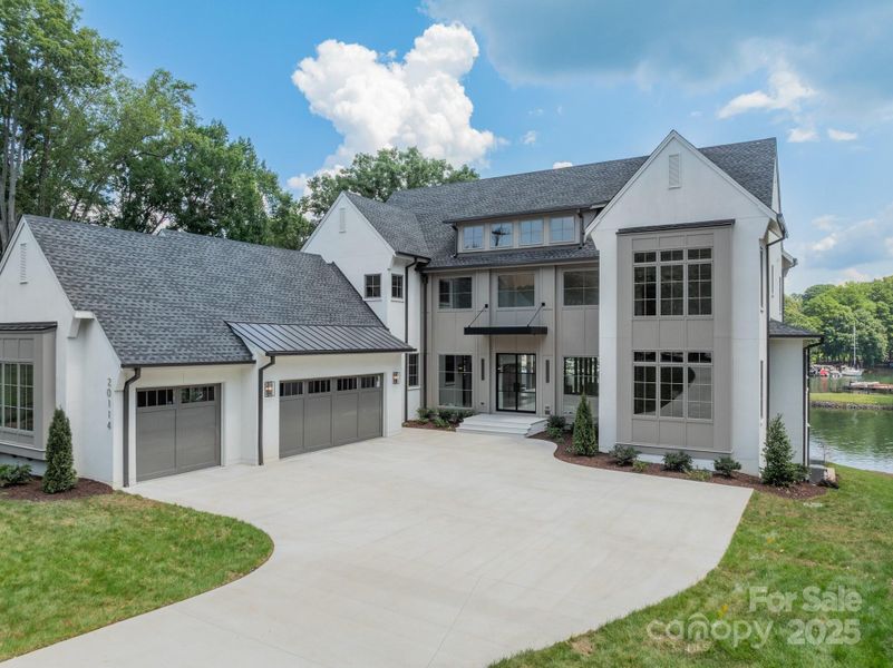 Front exterior of a new home in , Cornelius, NC, highlighting curb appeal (Image 2).