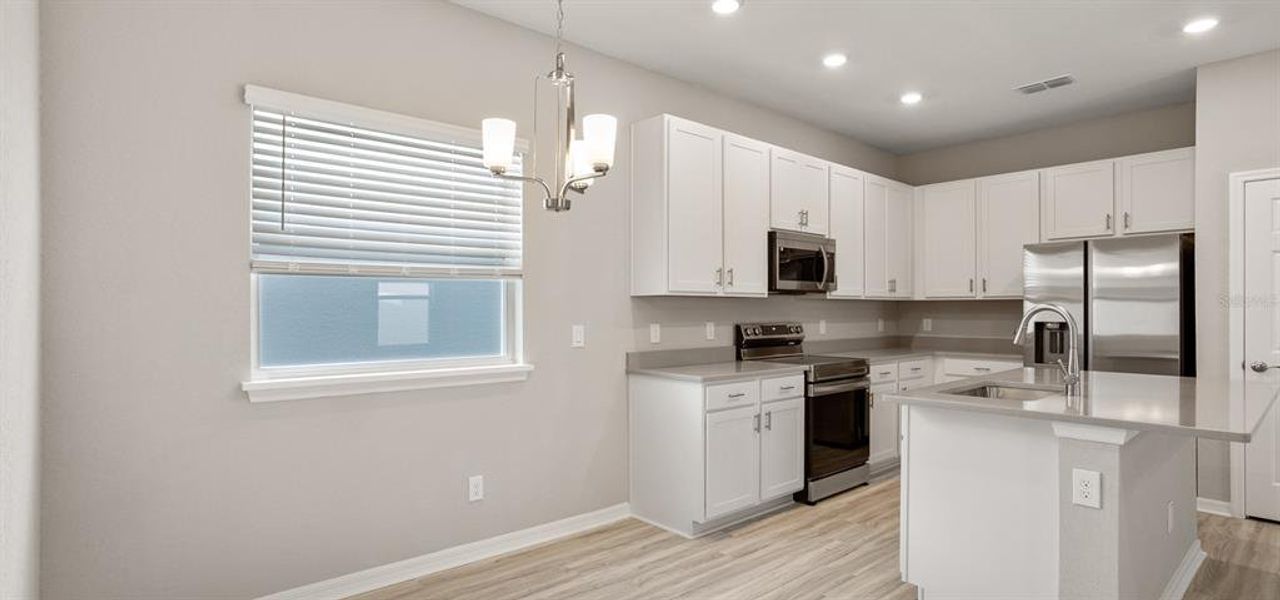Furnished interior view inside a new home in , St. Cloud (Image 5).