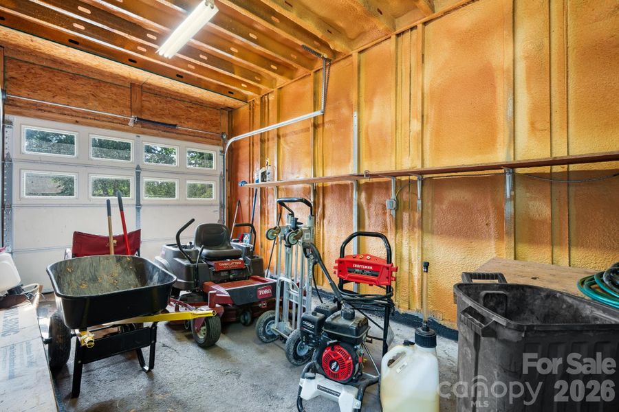 1 Car garage/ workshop with power and insulation. Single carport, loft and storage room at back of garage.
