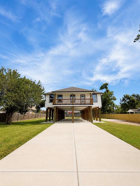 Front exterior of a new home in , Shoreacres, TX, highlighting curb appeal (Image 1). Front exterior of a new home in , Shoreacres, TX, highlighting curb appeal (Image 1).