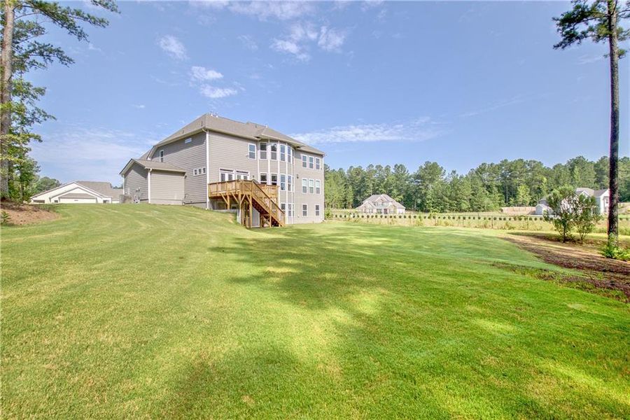 Front exterior of a new home in Genesee, Newnan, GA, highlighting curb appeal (Image 2).