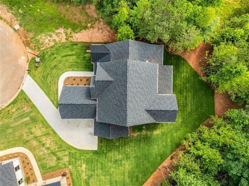 Front exterior of a new home in , Jefferson, GA, highlighting curb appeal (Image 29).