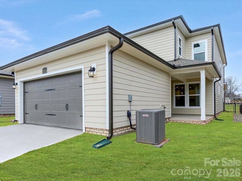 Exterior details and patio area of a home in Whitley Preserve – Park Collection, Mint Hill (Image 4).