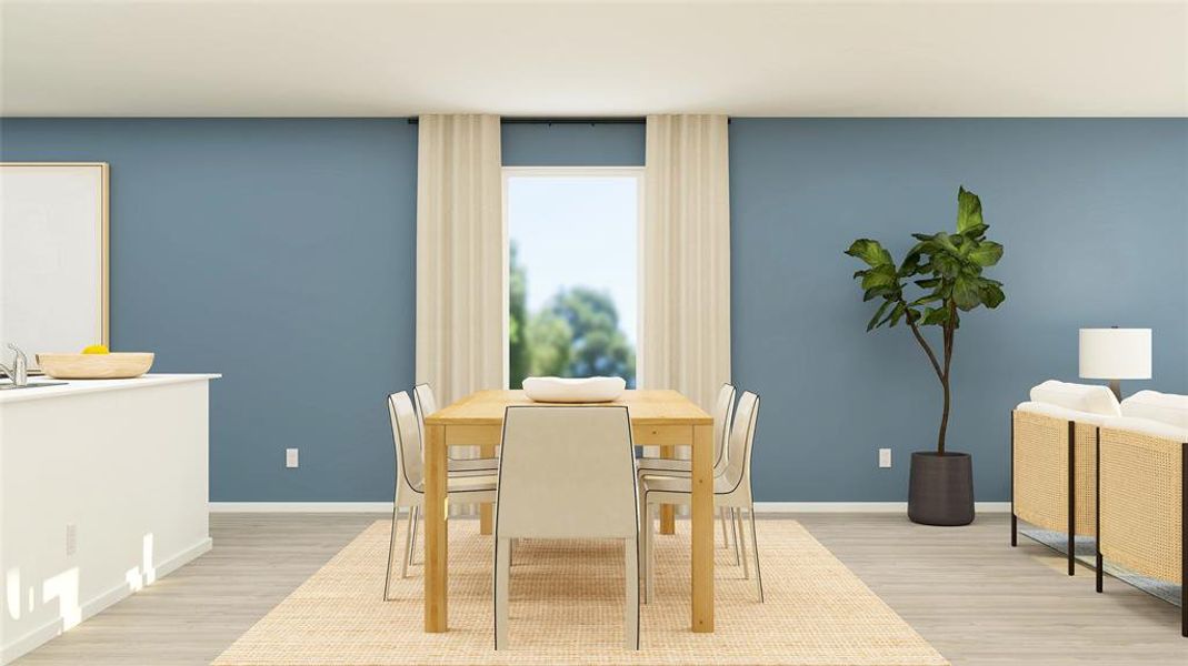 Dining room with light hardwood / wood-style floors