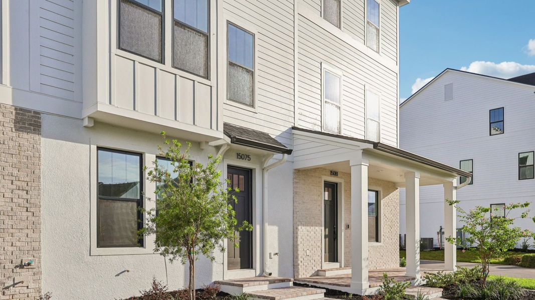 Exterior details and patio area of a home in Parkview at Hamlin, Winter Garden (Image 2). Exterior details and patio area of a home in Parkview at Hamlin, Winter Garden (Image 2).