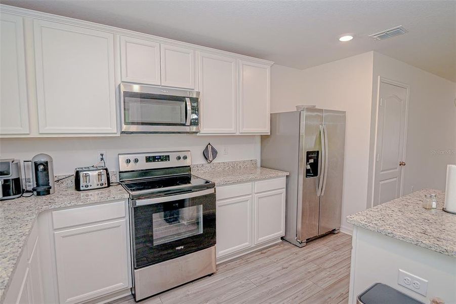 Furnished interior view inside a new home in , Kissimmee (Image 3).