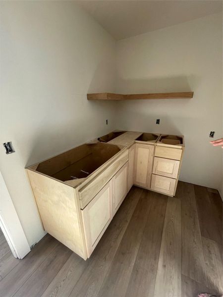 Kitchenette in upstairs living area with room for a refrigerator. Kitchenette in upstairs living area with room for a refrigerator.