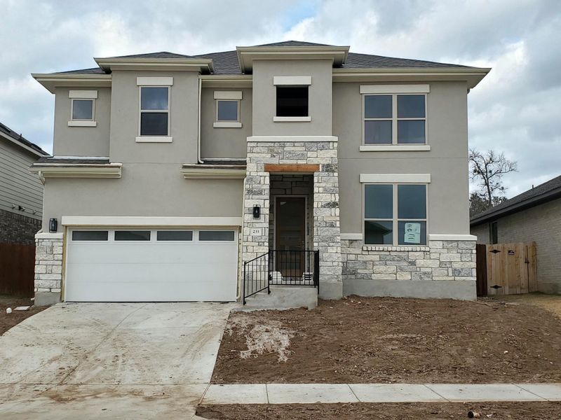 View of front of home featuring a garage