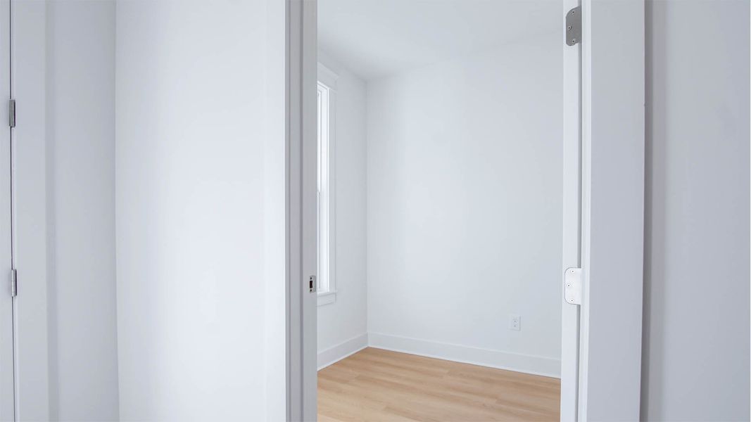 Representative unfurnished interior of a home built from the Trenton by D.R. Horton in Parkside, Santa Rosa Beach (Image 13).