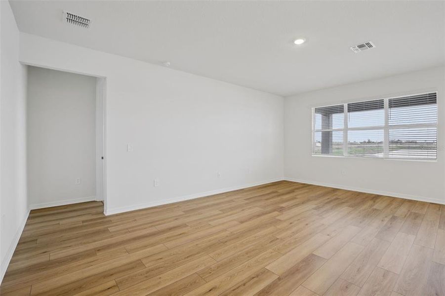 Spacious, unfurnished interior of a new home in Coasterra - Reserve Series, Palmetto (Image 29).