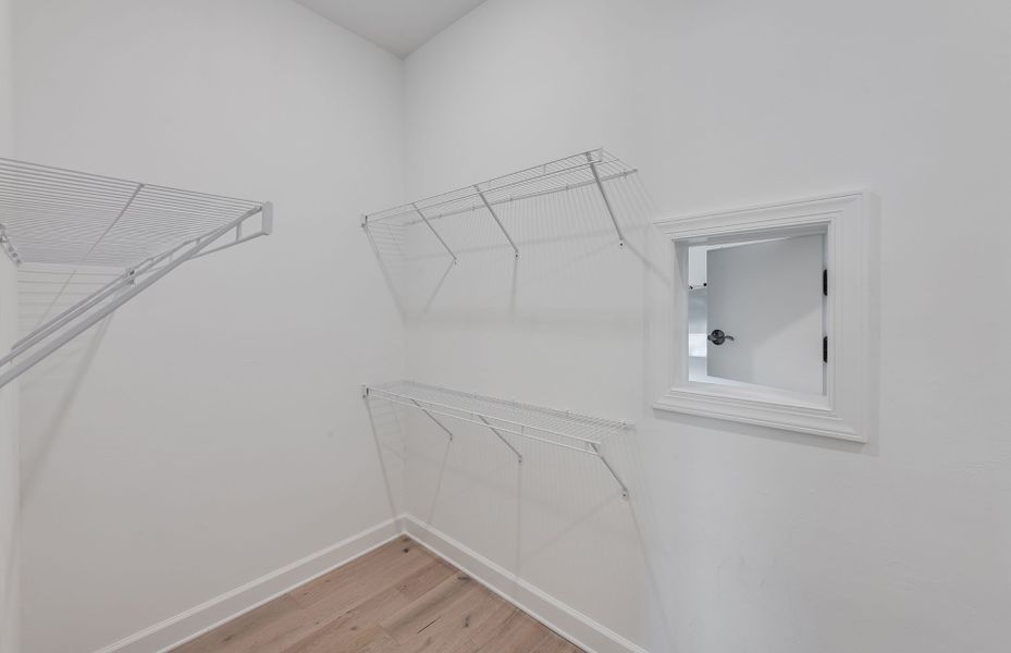 Representative unfurnished interior of a home built from the Prestige by DiVosta in Terreno, Naples (Image 18). Representative unfurnished interior of a home built from the Prestige by DiVosta in Terreno, Naples (Image 18).