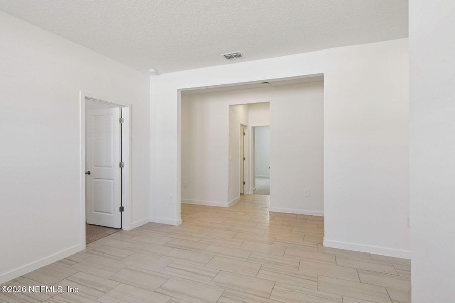 Spacious, unfurnished interior of a new home in Lakes at Bella Lago - Signature Series, Green Cove Springs (Image 37).