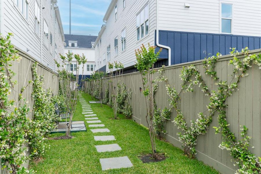 Nice common area between the back yards if you want to stroll with the dog. Just nice to have another outdoor space.