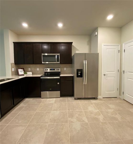 Furnished interior view inside a new home in , Kissimmee (Image 4).