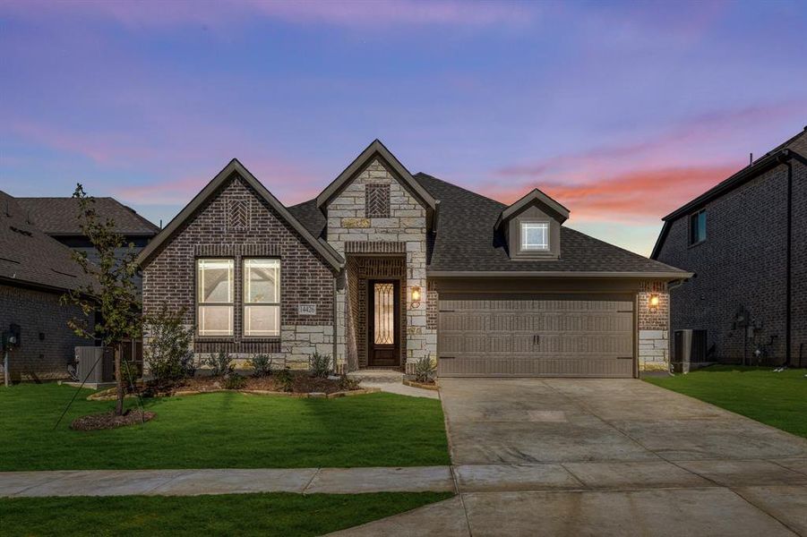 Front exterior of a new home in Creekview Meadows, Pilot Point, TX, highlighting curb appeal (Image 2).