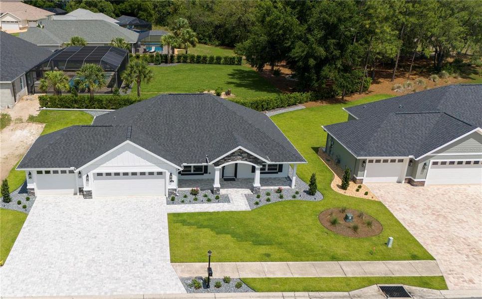Front exterior of a new home in , Dunnellon, FL, highlighting curb appeal (Image 18).