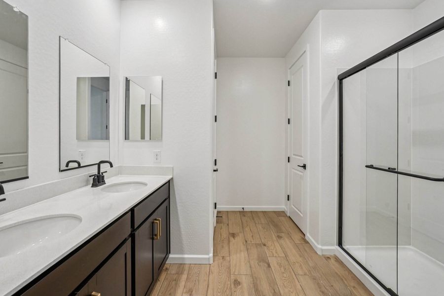 Primary bath. Finishes may vary by community.