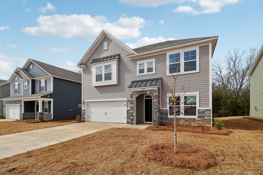 Representative exterior photo of a completed home built from the Porter II by Great Southern Homes in Cottages at Roofs Pond, West Columbia, SC (Image 35).