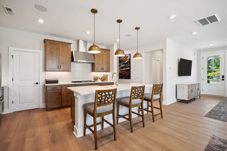 Representative furnished interior of a home built from the Torrence by Tri Pointe Homes in Seven Oaks, Belmont (Image 15).
