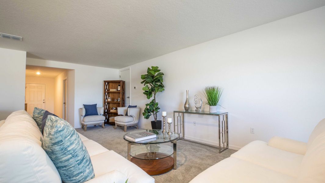 Representative furnished interior of a home built from the Orchid by Maronda Homes in Coastal Communities, Edgewater (Image 5).