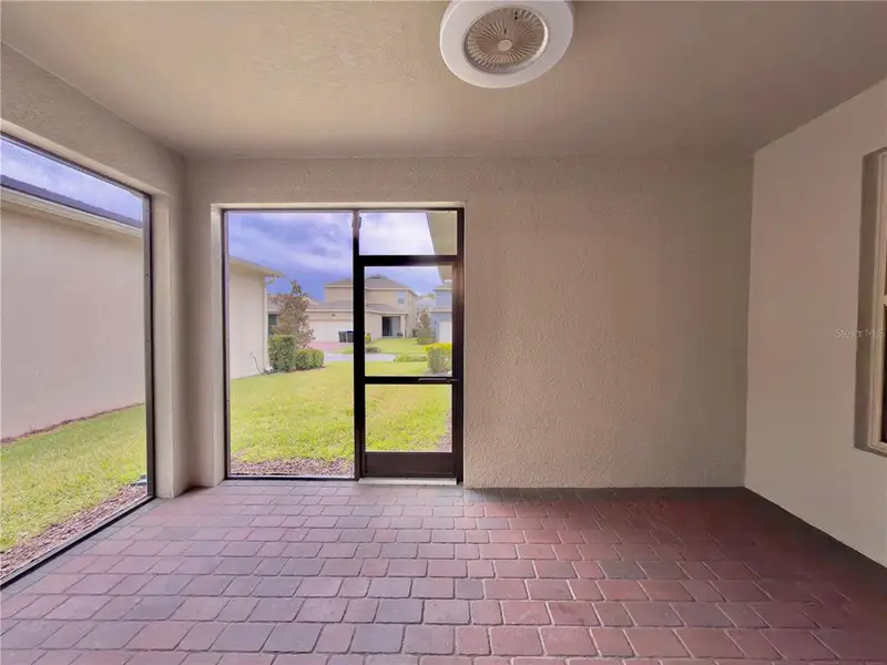 Exterior details and patio area of a home in Waterleigh, Winter Garden (Image 4). Exterior details and patio area of a home in Waterleigh, Winter Garden (Image 4).