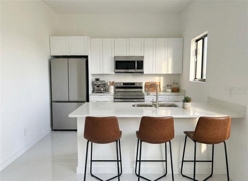 Furnished interior view inside a new home in , Cape Coral (Image 7).