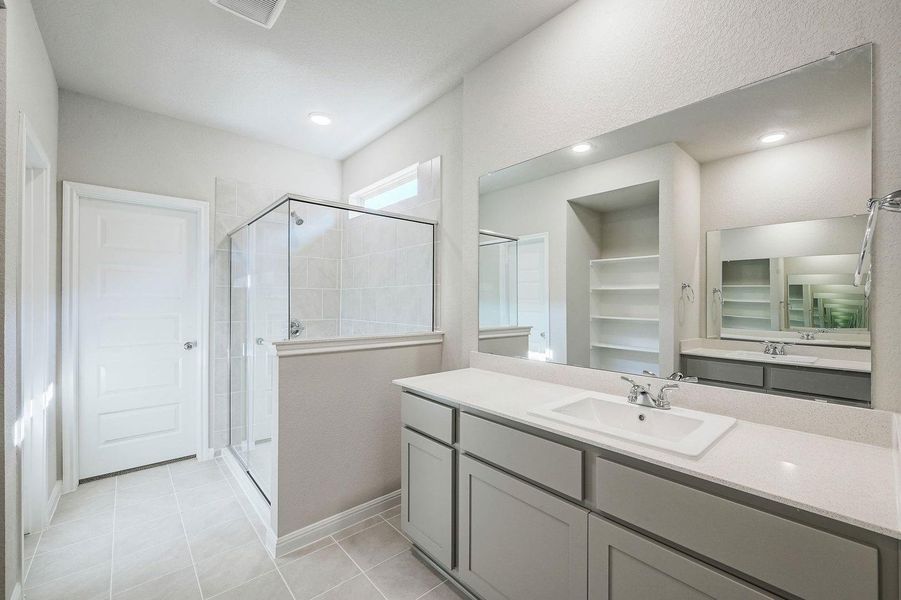 Primary Bath in the Willow home plan by Trophy Signature Homes – REPRESENTATIVE PHOTO