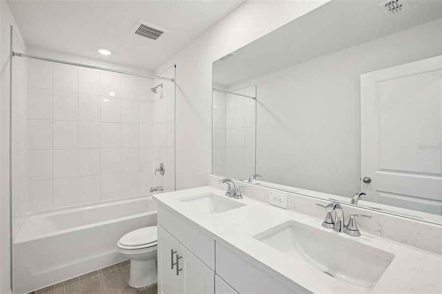 Furnished interior view inside a new home in Two Rivers - Classic Series, Zephyrhills (Image 11).