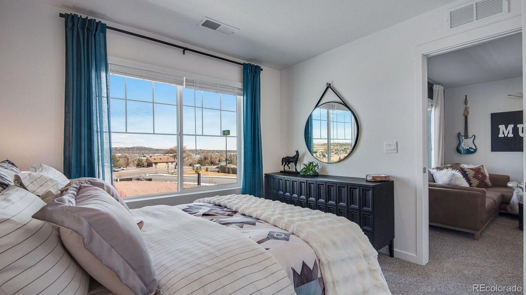 Furnished interior view inside a new home in The Ridge at Lorson Ranch, Colorado Springs (Image 25).