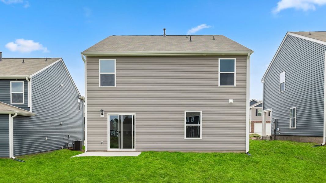 Front exterior of a new home in Durbin Meadows, Fountain Inn, SC, highlighting curb appeal (Image 18). Front exterior of a new home in Durbin Meadows, Fountain Inn, SC, highlighting curb appeal (Image 18).