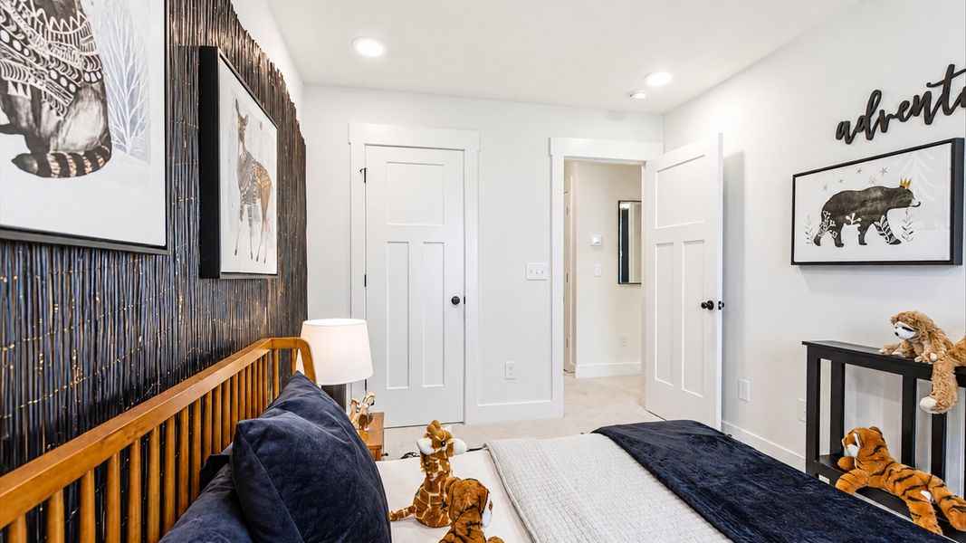 Memorable space offering plush carpet underfoot and a thoughtfully planned walk-in closet at the Clarke Townes community
