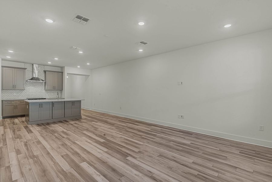 Spacious, unfurnished interior of a new home in Harvest at Ovation - Townhomes, Winter Garden (Image 14).