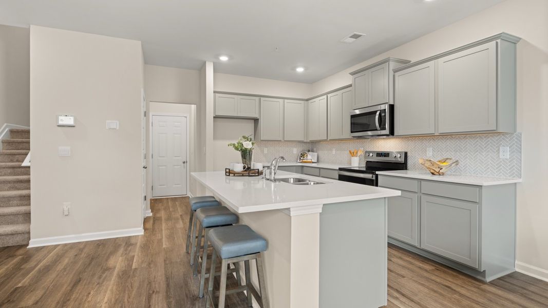 Representative furnished interior of a home built from the Salisbury by D.R. Horton in Echo Glen, Stockbridge (Image 7).