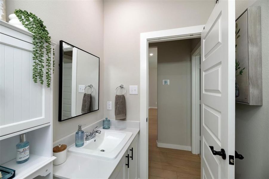 Bathroom with vanity and light wood-type flooring Bathroom with vanity and light wood-type flooring
