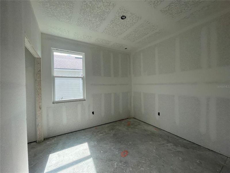 Spacious, unfurnished interior of a new home in Palm Series at Seminole Palms, Palm Coast (Image 10).