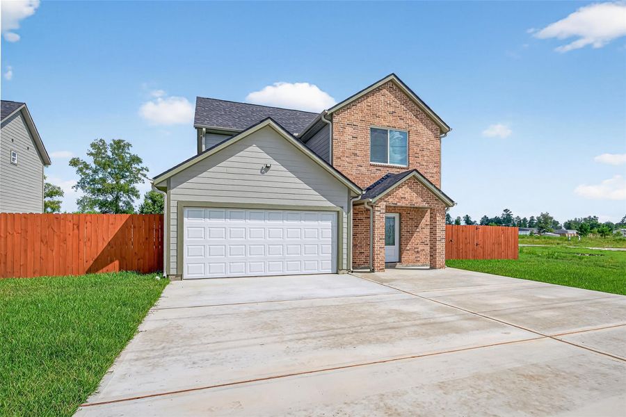 Front exterior of a new home in , Cleveland, TX, highlighting curb appeal (Image 24).