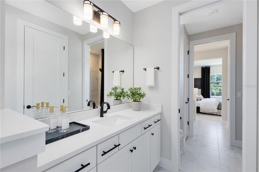 Furnished interior view inside a new home in Parkside Trails, Clermont (Image 23).